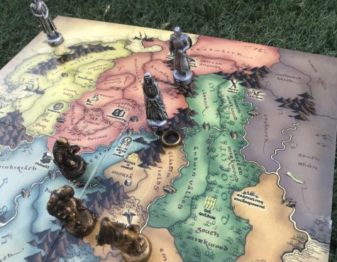 Board game depicts  Galadriel, Orcs and other characters from Middle Earth.