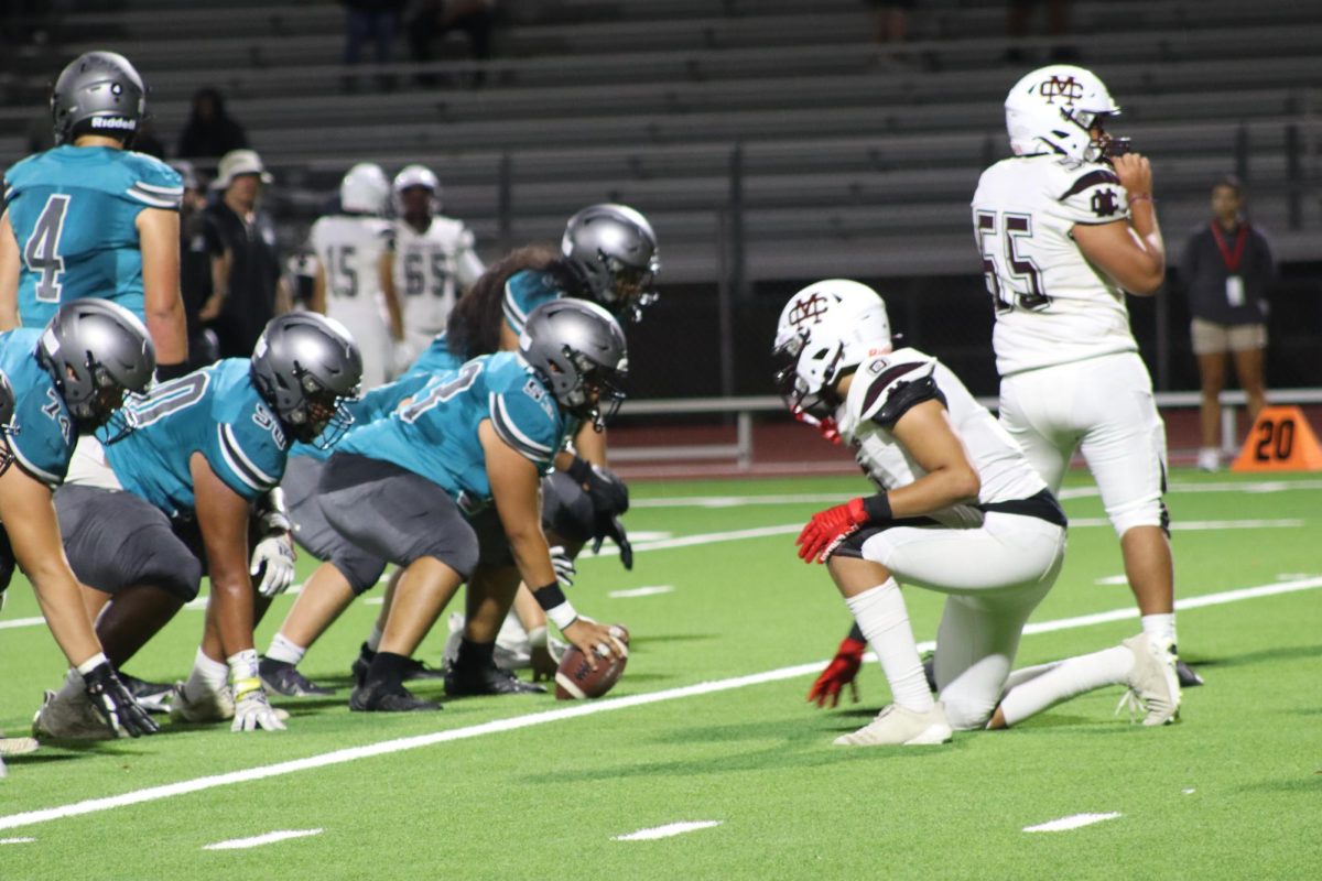 Skyhawks get in position for the snap during the Aug. 18 game against Cimarron-Memorial HS.