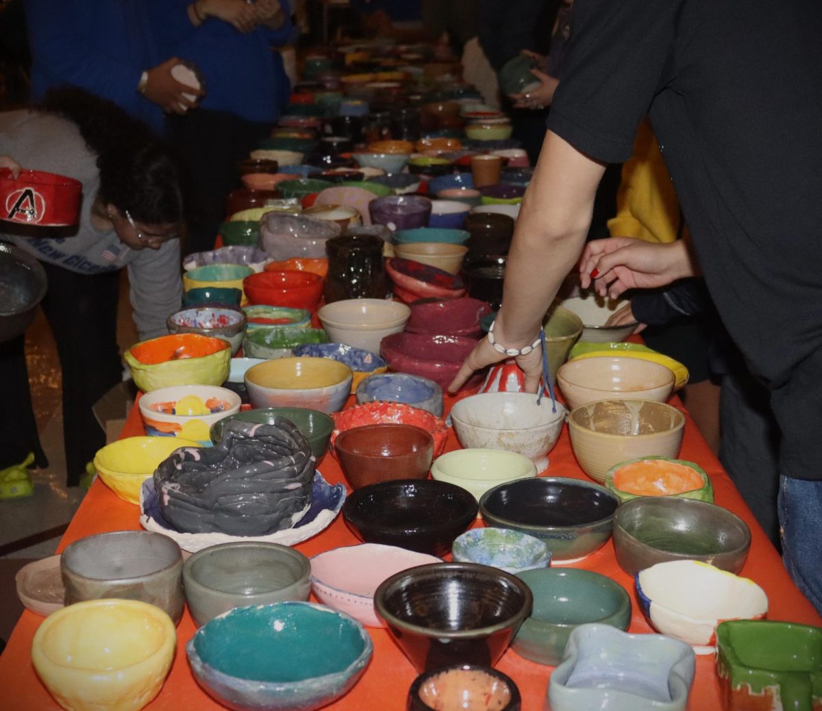 An array of colorful bowls made by Silverados ceramics classes are ready to be chosen at the Empty Bowls event on Nov. 16.