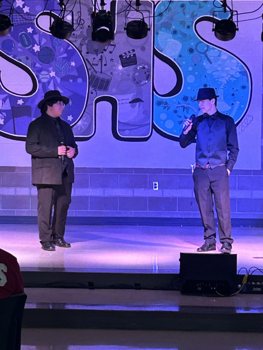 Juniors Ryan Weter and Brian Catacutan perform the song Guys and Dolls from the musical Guys and Dolls at Broadway Cafe on Jan. 30.