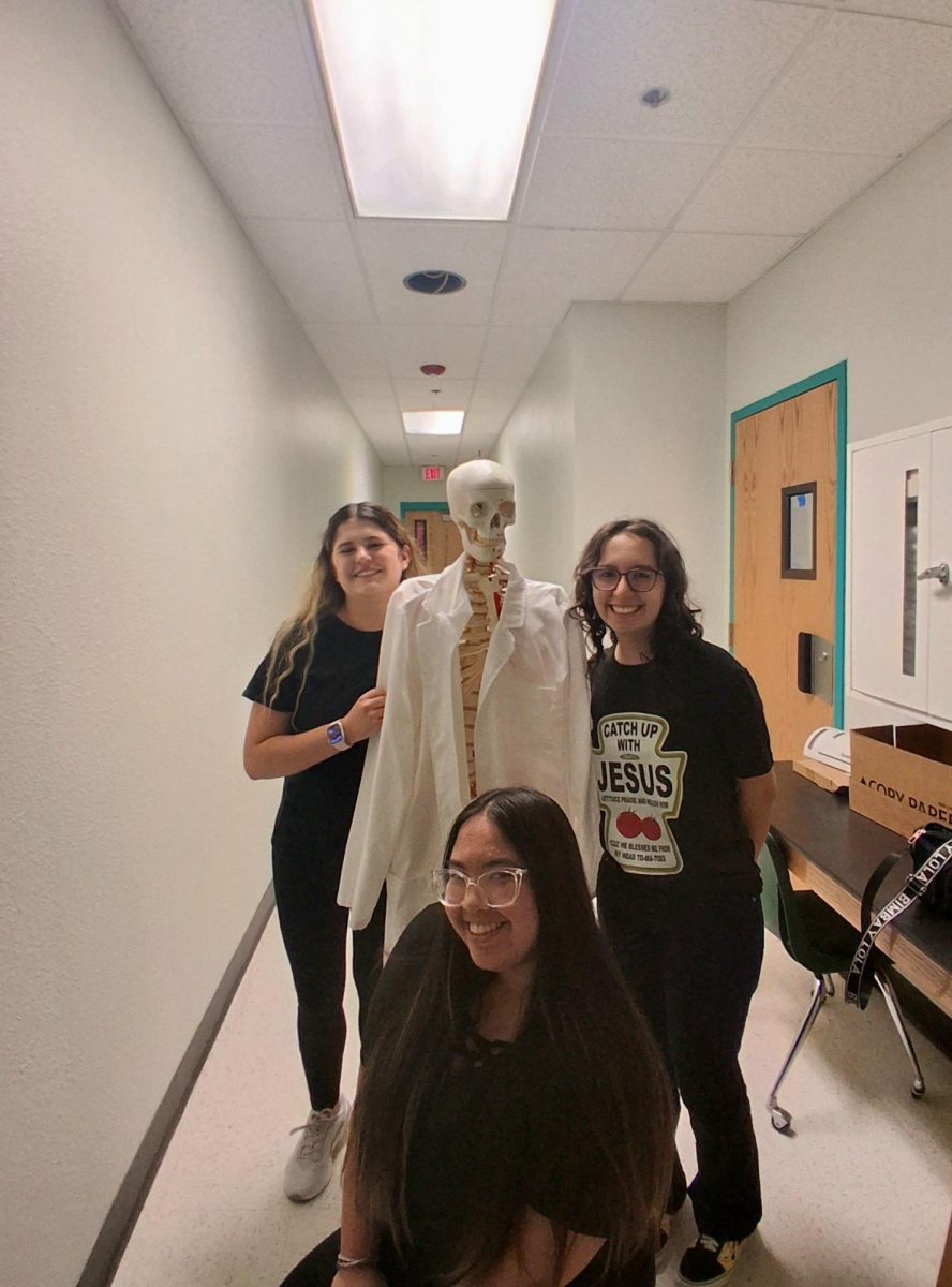 Senior Saliye Demarchena, Senior Kiana Tolentino, Senior Baylin DeFranco, and Freshman Skelly dressed up for Color Day