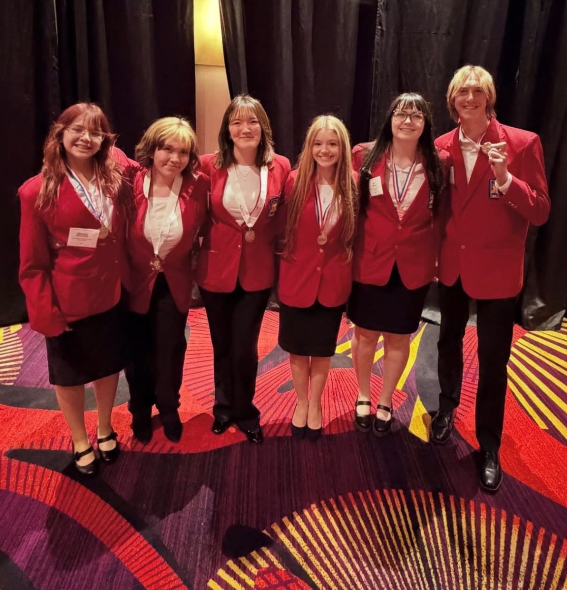 Winners at the SkillsUSA competition show off their medals on April 10. From left to right: Brianna Escalera, Dezarae Gonzalez, Kara Silver, Sophia Booth, Nya Cimino and Lucas Pfahler